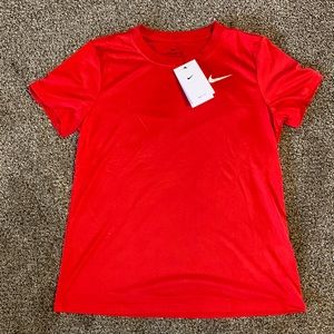 Women’s Nike Dri-Fit shirt. Color-Red. Size M